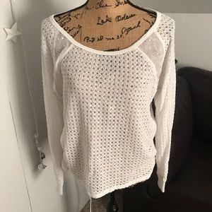 White sweater with jewels on chest
